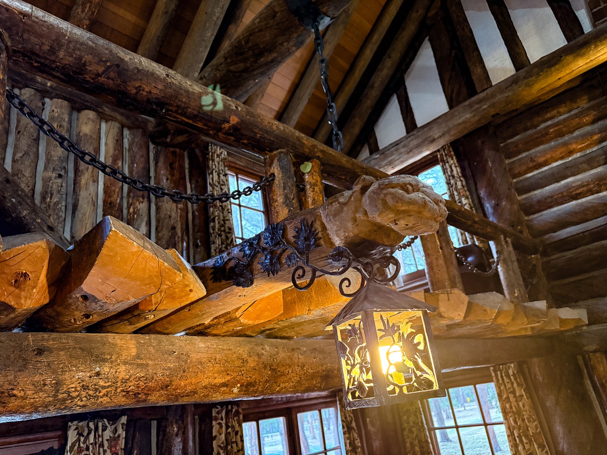 Wooden interior of Ponderosa Lodge at La Foret Conference and Retreat Center, with a hanging lantern and chain.